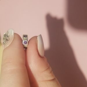 Pandora bracelet charm with purple crystals